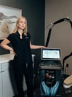 lady with laser hair removal machine